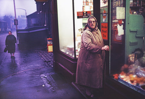 John Bulmer – Old Lady Outside Shop Dusk [North UK, ENGLAND 1965]